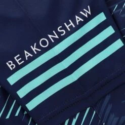 Wicklow GAA Kids' Short Sleeve Training Top Marine / Green -Sport Style Shop wicklow training jersey 2023 mar mint wht 3s p5 1